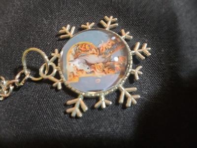 a snowflake pendant with a unicorn and the letter R - Thumbnail 2