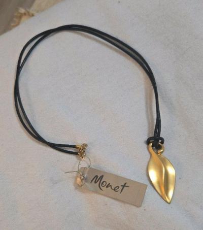 Monet Gold Tone Leaf Pendant Necklace on Black Cord