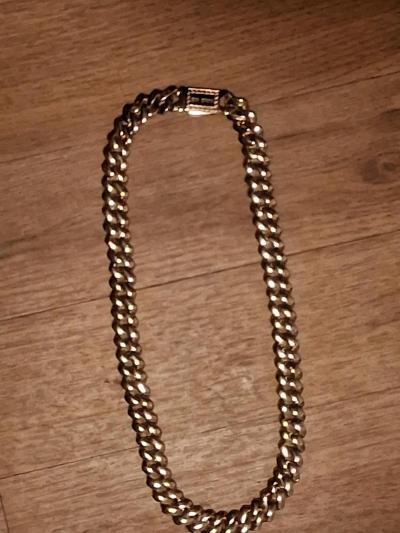 Double side of the chain gold in back and dimons in front