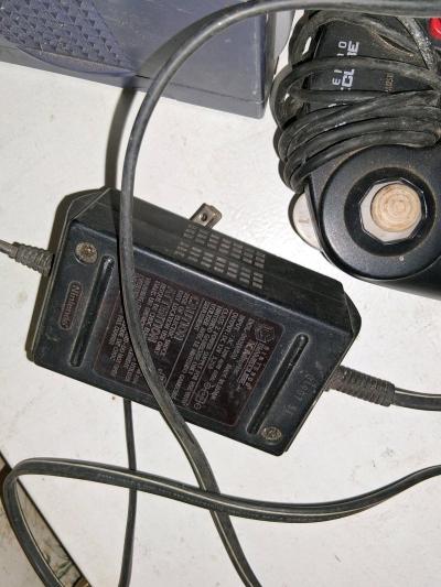 gamecube and 4 controllers