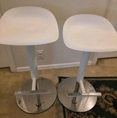 IKEA JANINGE bar stool featuring a white seat and a chrome b