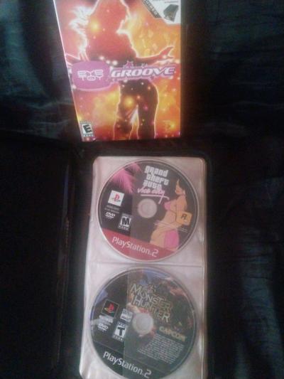 14 Playstation 2 games a code breaker disc and Xbox halo 2
