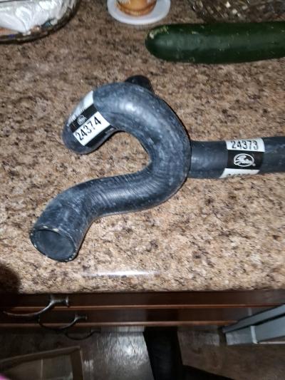 left axle and water pump hose brand new doing box never been - Thumbnail 4