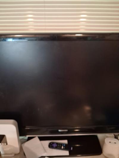 swirl around flat screen TV with roku remote and roku adapte - Thumbnail 2