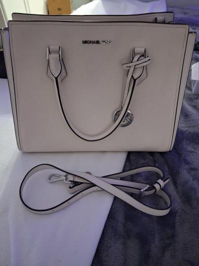 white Michael kors bag with strap extension
