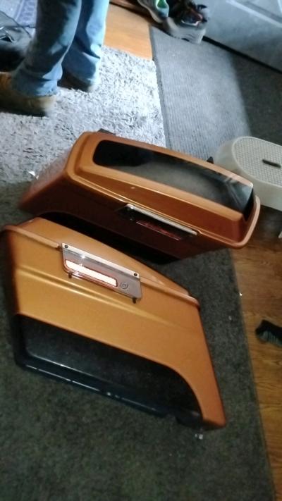 2 used orange and black HarleyDavidson saddlebags