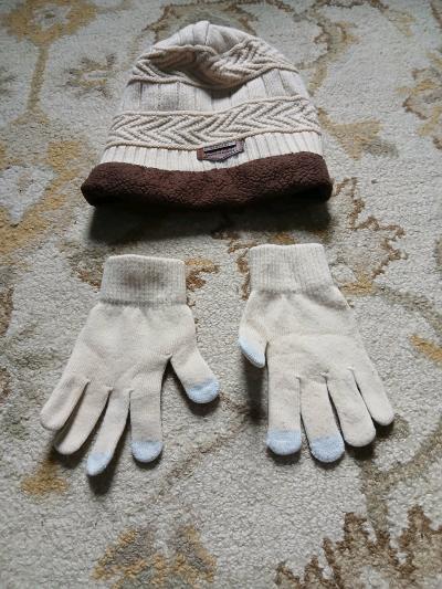 A cozy knit beanie hat and matching gloves The hat has a tex - Thumbnail 2