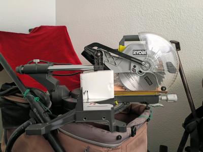 brand new Ryobi milter saw still in original packing