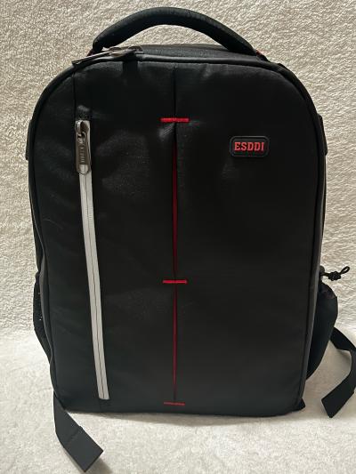ESDDI black camera backpack with red accents and reflective