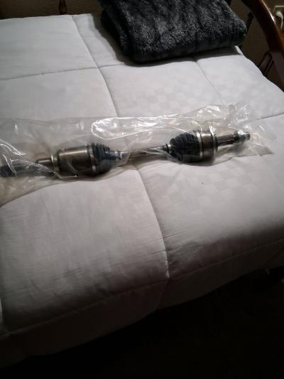left axle and water pump hose brand new doing box never been