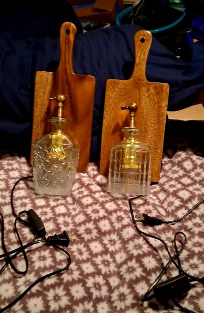 A pair of custom built wall light sconces