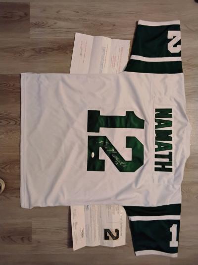 Football jersey with paper work and also sing by player