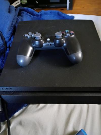 PlayStation 4 good condition used comes with chords games - Thumbnail 9