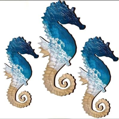 Set of three Wooden Sea Horses