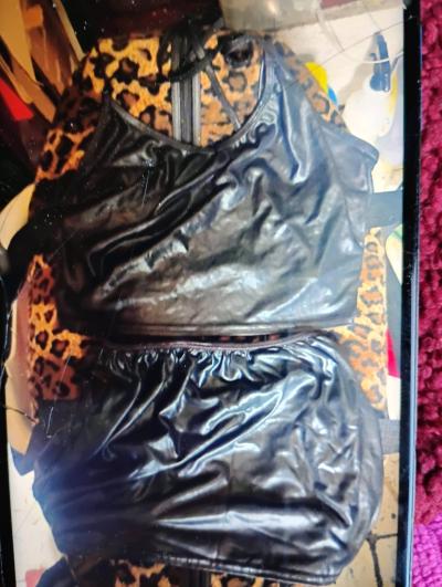 A Sexy Black Two Piece Plastic Leather Halter Top  and Skirt