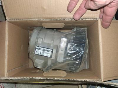 new AC compressor in box