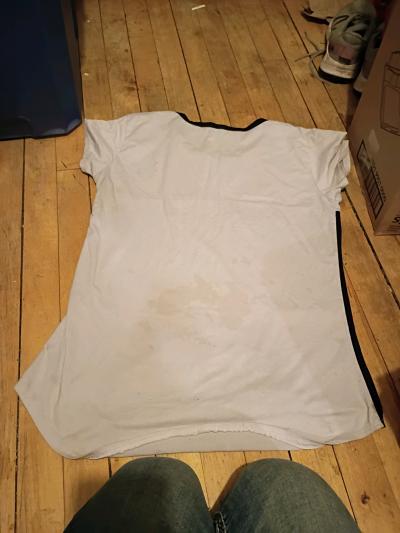 womans size L hustle shirt made of cotton