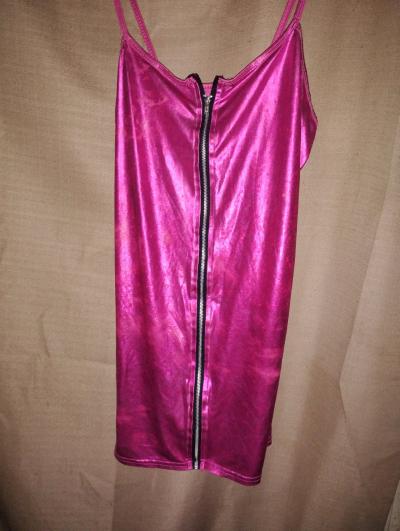 A Sexy Womans Pink Zippered Short Lingerie Outfit