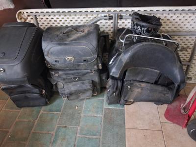 motorcycles and various travel bags