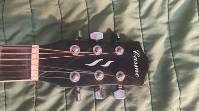 acoustic guitar with a fresh pair of strings