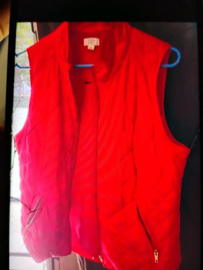 A Womans Pink Large Vest with Pockets