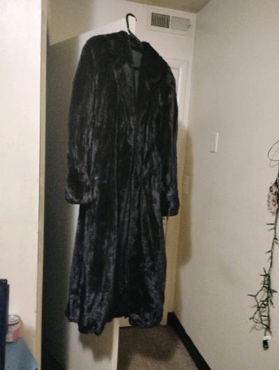 long black fur coat