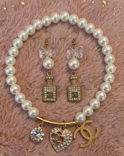gold and pearl fashion earring and bracelet set