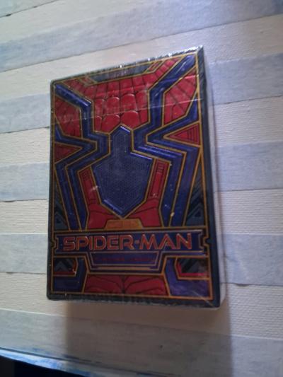 Spiderman  playing cards by one and get the second half off