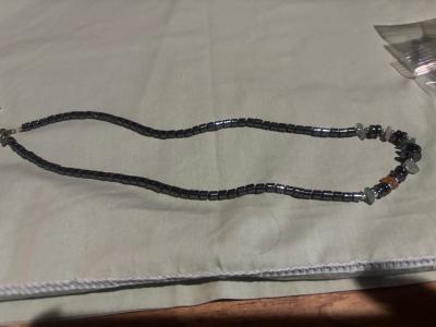 steel necklace with multicolored gemstones