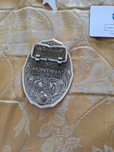 Cross spell buckle