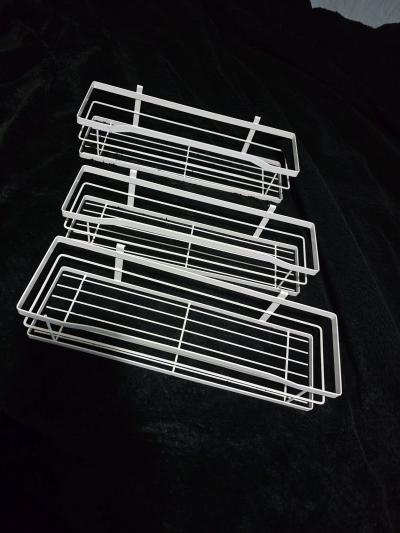 3 white metal baskets
