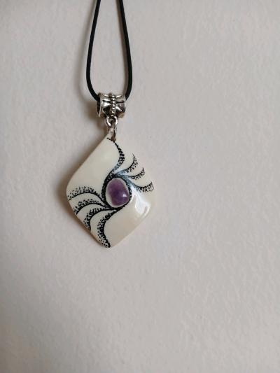 mammoth tusk pendant with natural amethyst