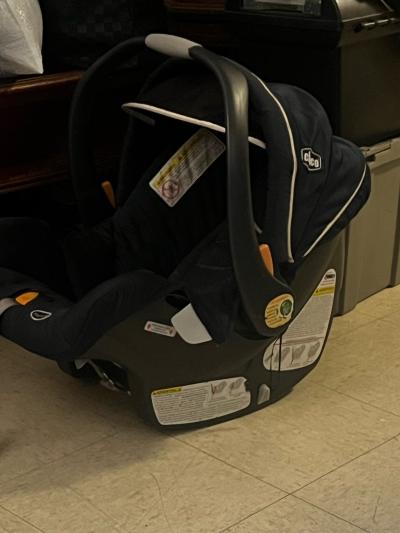 Infant rear facing car seat with all working parts