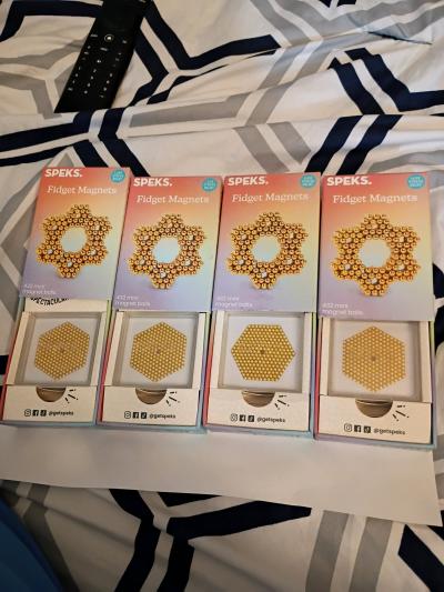 4 boxes of Speks Fidget Magnets