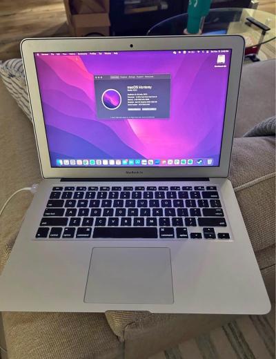 Sleek Silver Apple Laptop  Brand Apple  Color Silver  Minima