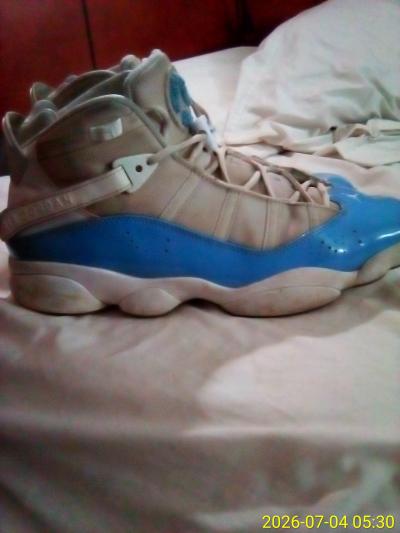 blue and white Jordan 11s mens size 10