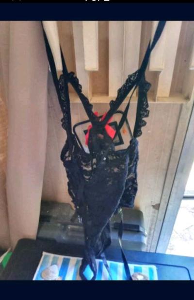 A Sexy Black and Red Crotchless Lingerie Outfit