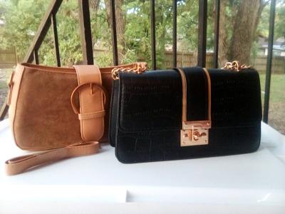 Two black and brown  purse