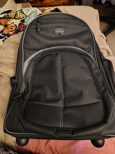 black rolling backpack and a purple non rolling backpack - Thumbnail 3