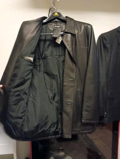 Sleek Kiton leather trench for men Smooth finish with minima