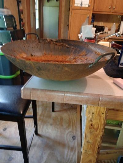 antique rusted cooking wok