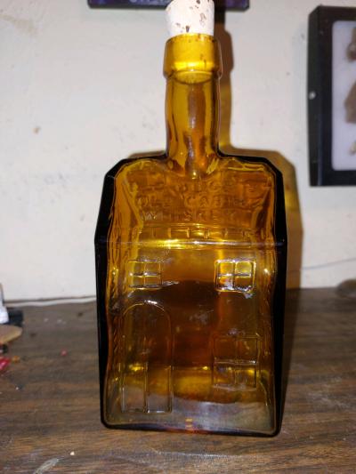 vintage bcboozs old cabin whiskey amber bottle