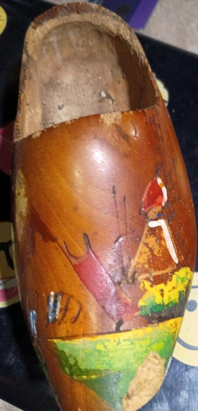 Little Wooden Shoe with pictures painted on it