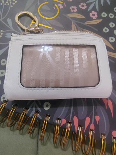 This is a white Victorias Secret foldover card case keychain