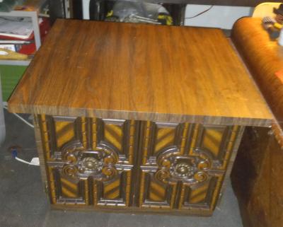 Vintage brown wood cabinet with 2 hinged carved wood doors