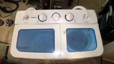 used small porterable washer with all hookups and cord