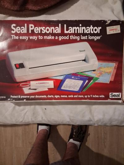 its a brand new in the box never  sealer personal laminator