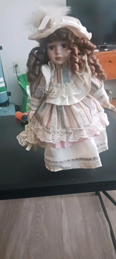 a vintage late 20th century decorative porcelain doll
