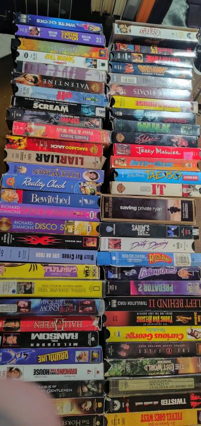 lot of DVDs and VHS types Android shape - Thumbnail 3