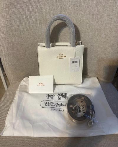 Brand new coach cally bag still has the tags